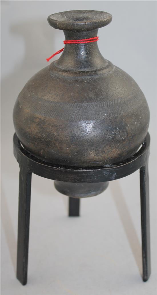 A Greek blackware bottle, Apulia, c.2nd century BC, 15cm, later metal stand